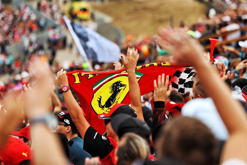 Fans holding Ferrari flag